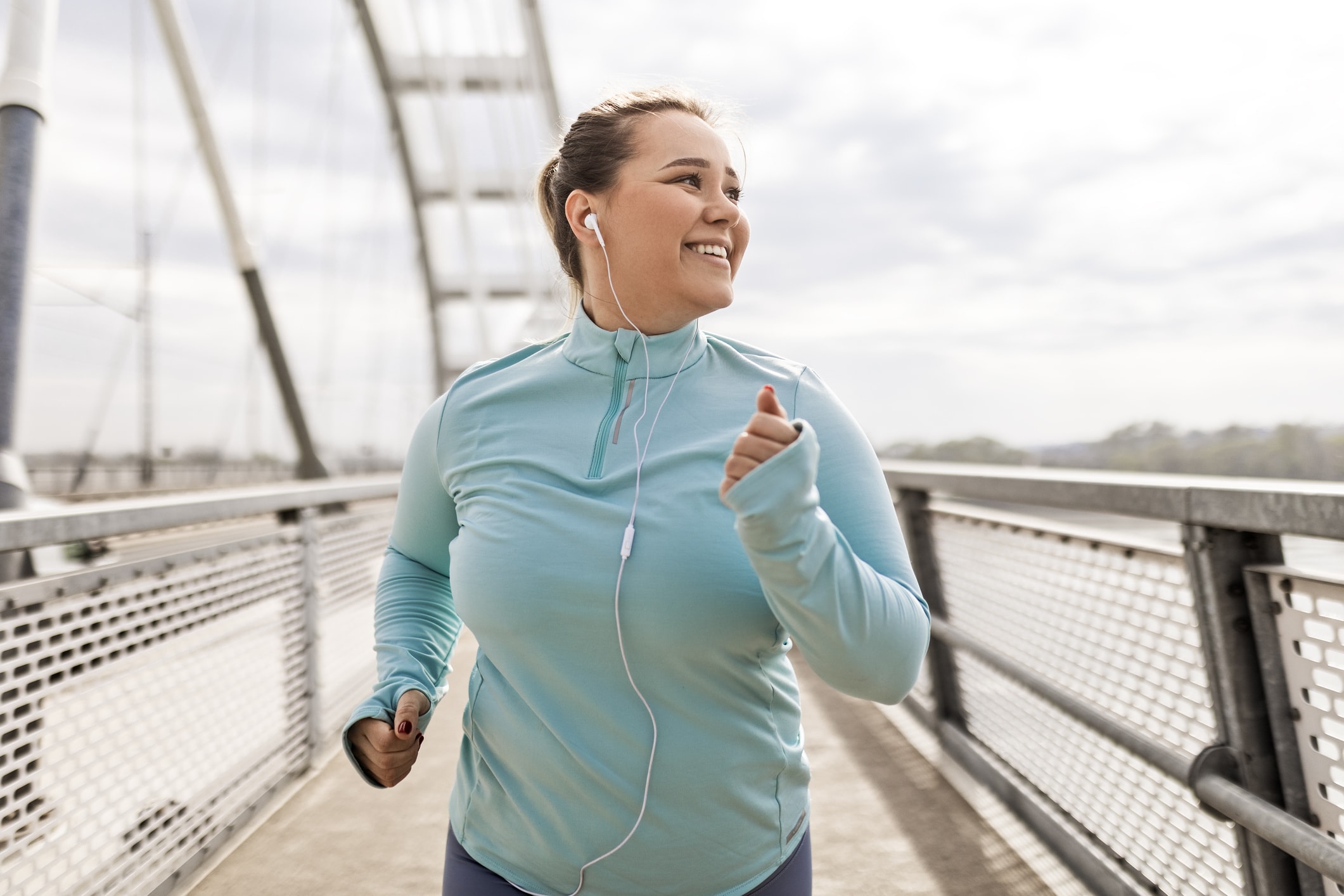 Woman running outdoors as part of an active lifestyle